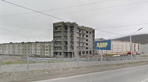 Unfinished building & LDPR advertising (Magadan, Russia)